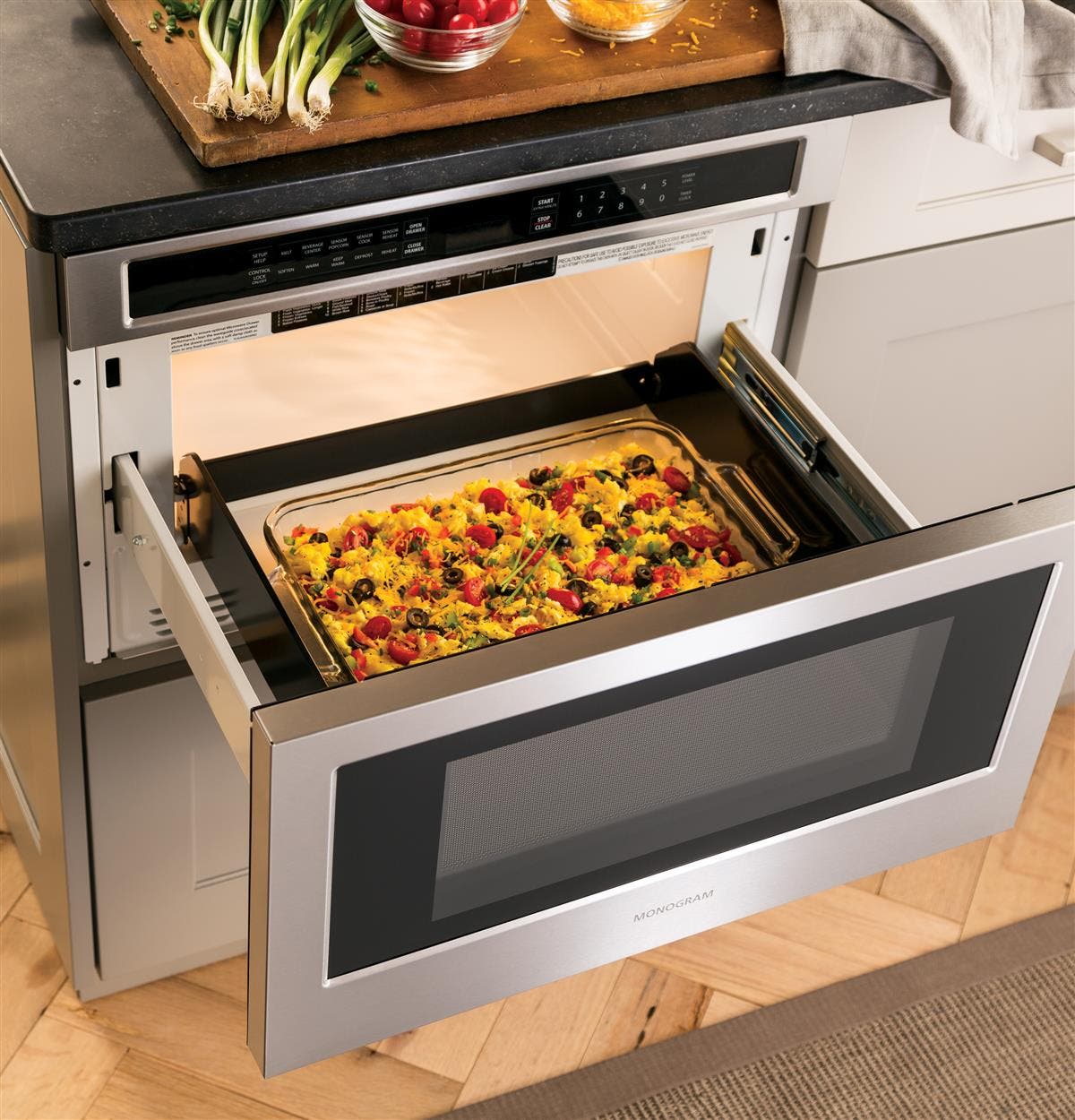 Monogram ZWL1126SJSS 1.2 Cu Ft Capacity