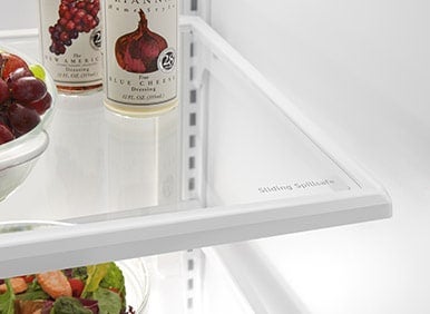 Sliding Spill Safe Glass Shelves Designed To Keep Spills Contained, Making Cleanup Easy