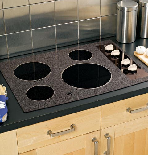 GE JP346CMCC Black Surface with Bisque Accents