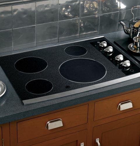 GE JP346SMSS Black Surface with Stainless Steel Accents