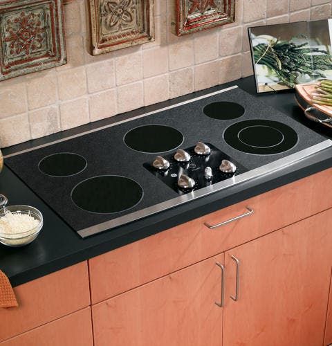 GE JP655SMSS Black Surface with Stainless Steel Trim