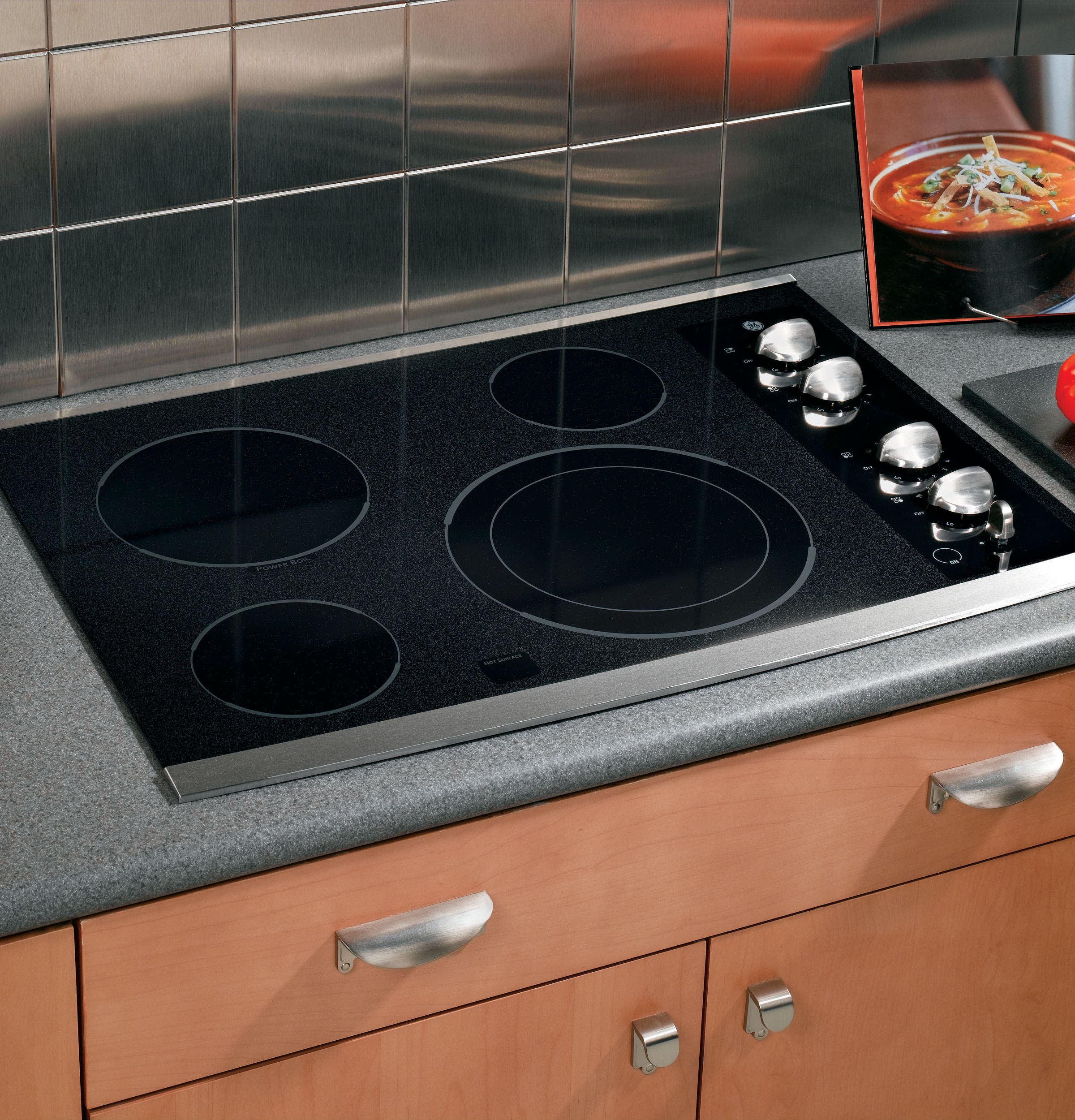 GE JP356SMSS Black Surface with Stainless Steel Accents