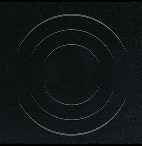 GE PP975WMWW White Pattern on Black Surface