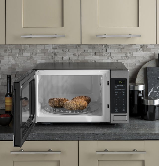 GE GCST16S1WSS 1.6 cu. ft. Countertop Microwave Oven with 1,150 W...