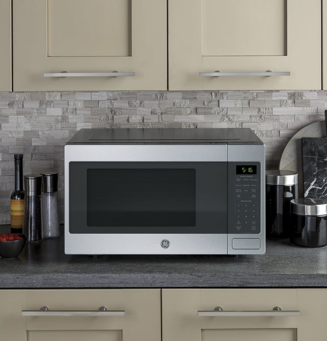 GE GCST16S1WSS 1.6 cu. ft. Countertop Microwave Oven with 1,150 W...