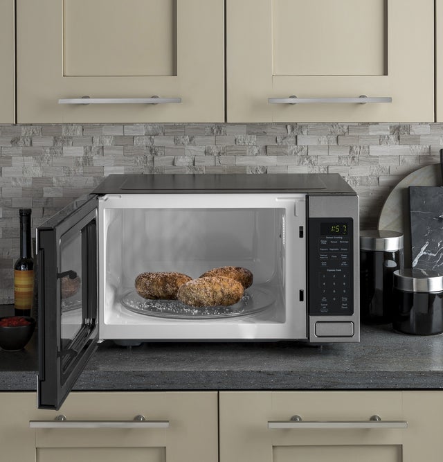 GE GCST16S1WSS 1.6 cu. ft. Countertop Microwave Oven with 1,150 W...