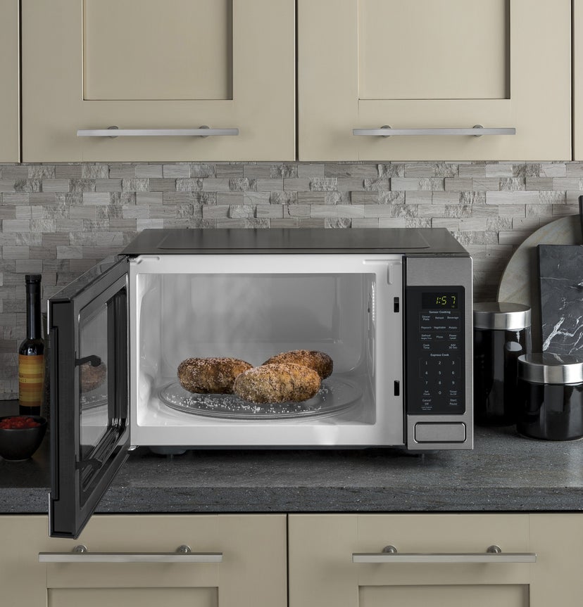 GE GCST16S1WSS 1.6 cu. ft. Countertop Microwave Oven with 1,150 W...